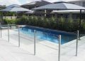 Elevate Your Outdoor Space with Glass Pool Fencing: A Modern Solution